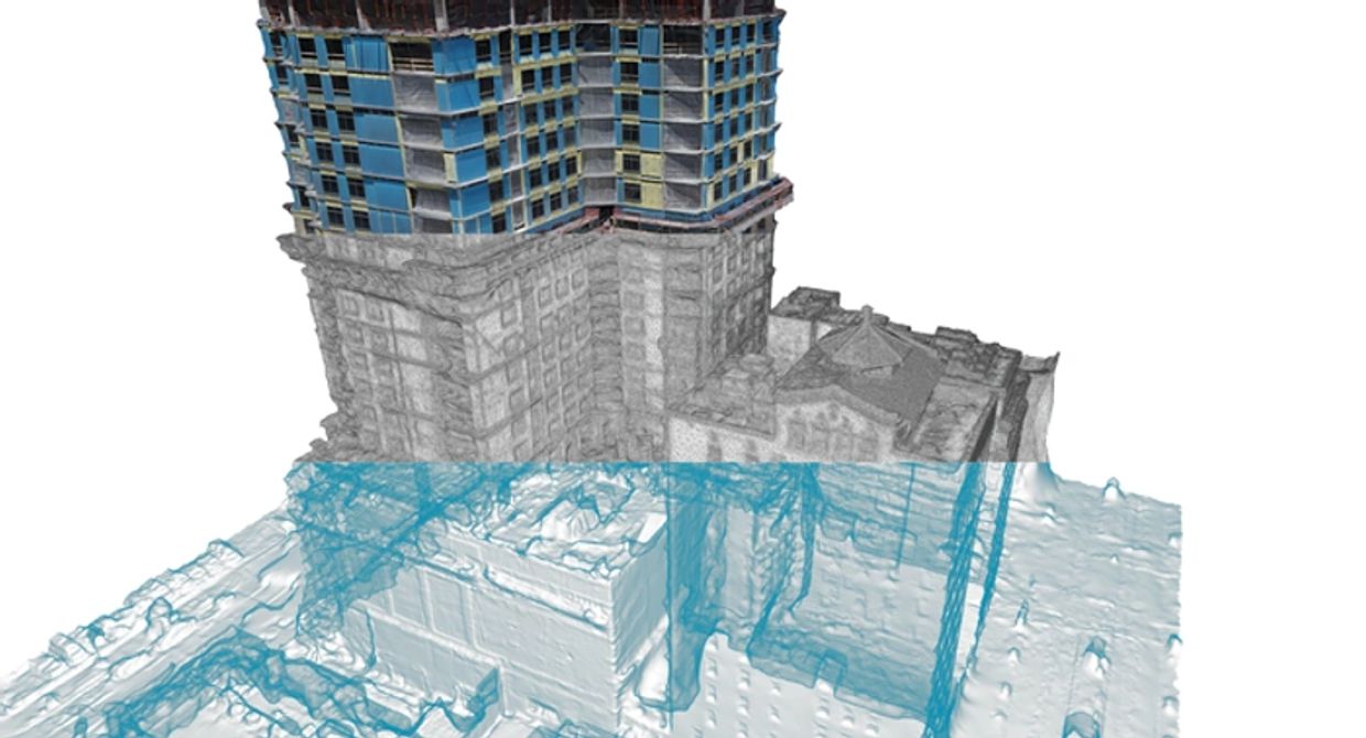 3D model showing a building's structure and surrounding terrain.