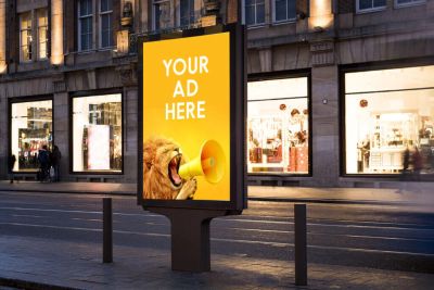 Street billboard with a lion and ad space.