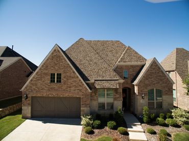 Residential roofing project showing freshly installed shingles