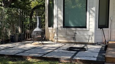 Concrete patio with black star gravel and steel edging we welded, this project we did in Westlake