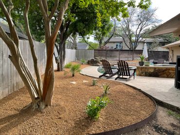 Flowerbed around the pool with Corten steel edging with crushed granite we did in Barton Creek