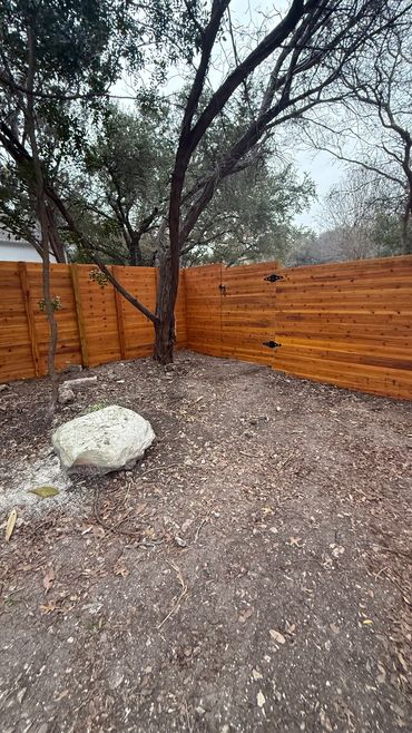 8ft Horizontal Cedar fence we did in Westlake hills tx and we also painted it with natural stain