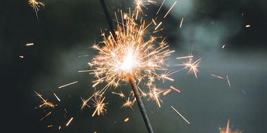 A firework sparkler, shining brightly
