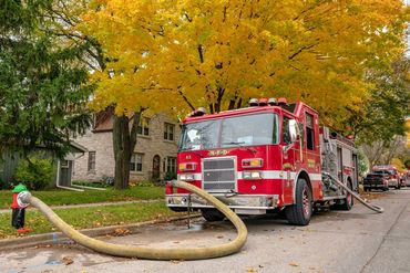 Fire engine hooked up to a hydrant
