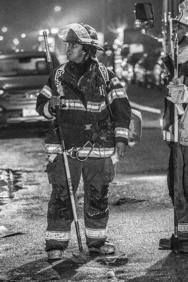 Firefighter holding a pike pole