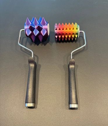 Master Nick's new toys, Devil's Paint Rollers, from sharppointedthings.com.