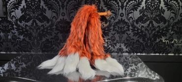 "Fluffinator" by Firebird Leather with Weighted Falls