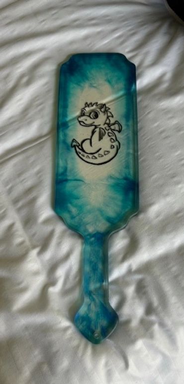 Epoxy Paddle Lady Dee won during the raffle donated by Exotic Epoxy.