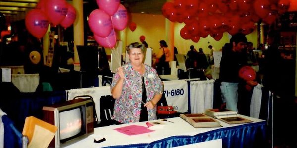 a woman holding barons in the event
