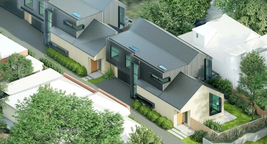 Modern residential houses with metal roofs and large windows.