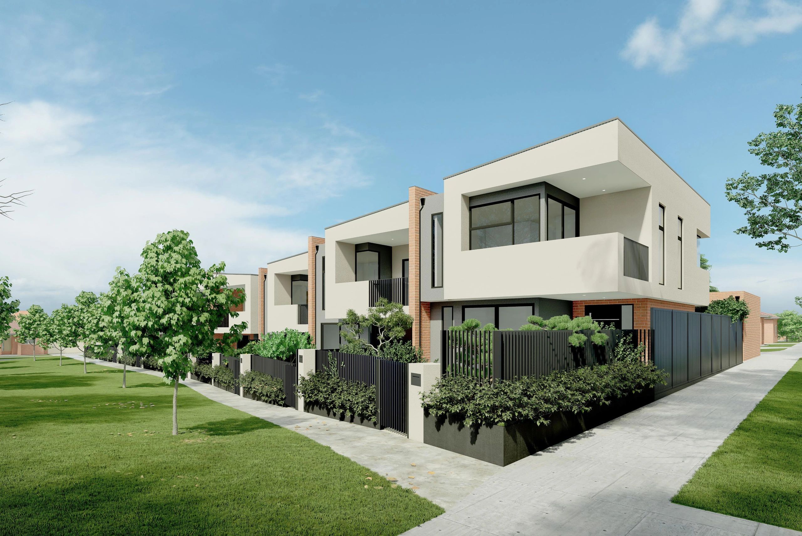 Modern row of houses with balconies and greenery.