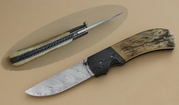First Flight folder knife with Damasteel blade by Robert Champion