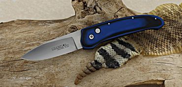 Prairie Ratter automatic with blue and black G10 handle by Robert Champion