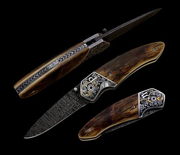 Lone Star folder knife with 24K gold inlay and engraving by Robert Champion