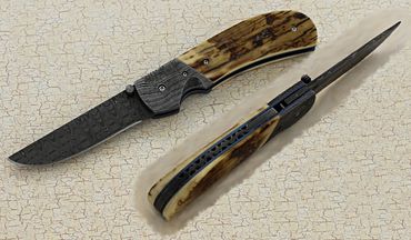 First Flight folder knife with Thorny Vine filework by Robert Champion