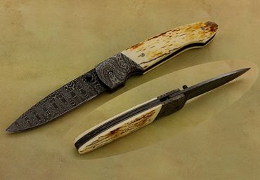 Vaquero folder knife with mosaic bolsters by Robert Champion