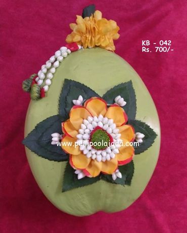 Pellipoolajada_KobbariBondam_Kurnool: Customised kobbaridondam designs with flowers and leaves