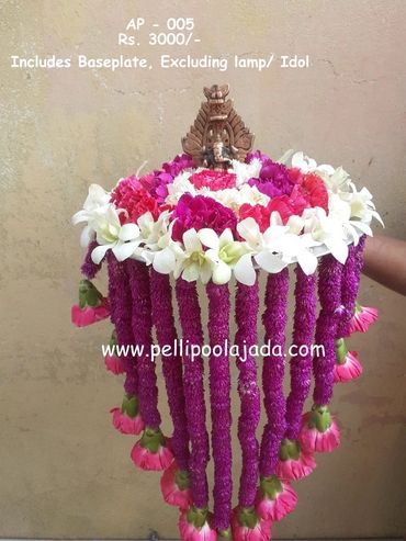 Pellipoolajada_AarthiPlateDecor_Kurnool: Aarthi plate decor with orchids and daisy strands