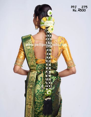 Contemporay netted poolajada with chrysanthemum knitted to the floral embellishments