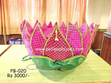 Pellipoolajada_Pellibutta_Tirupati: Lotus shaped pellibutta in pink and golden color