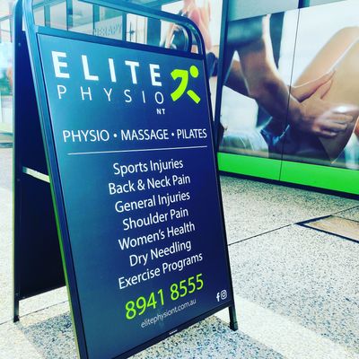 Sidewalk sign for Elite Physio offering various treatments.