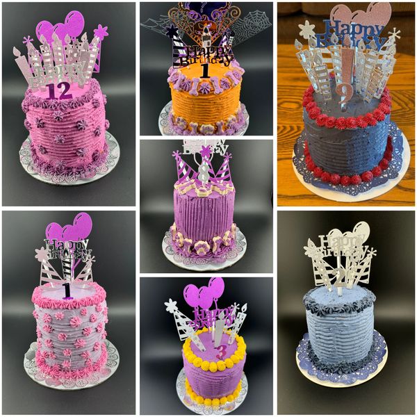 Colorful birthday cakes with crowns and number toppers.