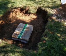 Septic components located and uncovered during a Title 5 inspection in Sterling