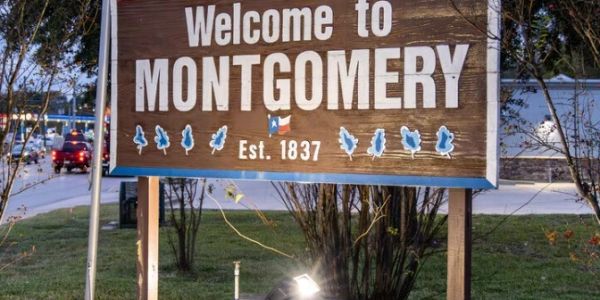 Welcome sign for Montgomery, established 1837.