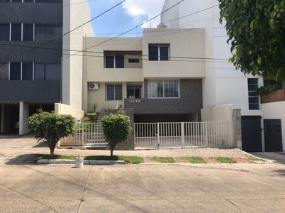 Modern Guadalajara, Jalisco house Outside you can see two small trimmed bushes.
