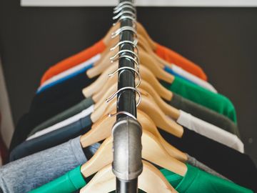 Various clothes on a rack