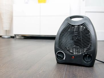 Electric heater on a floor