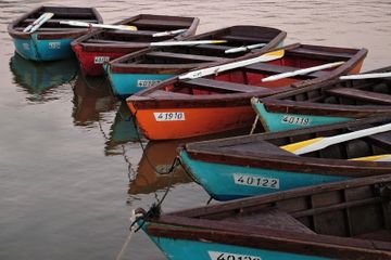 Red Oar Writing canoes on a lake 