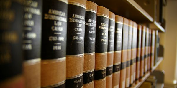 row of legal books on a shelf