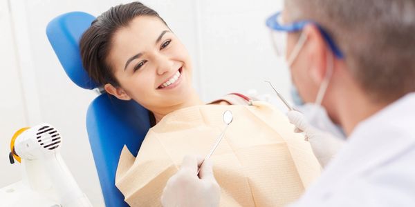 satisfied patient receiving dental care