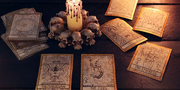 tarot cards and a candle