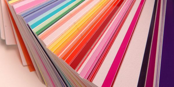 Stack of brightly colored paper.