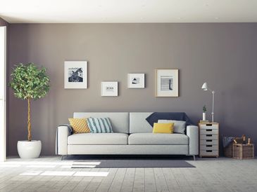 Modern room interior with comfortable sofa
