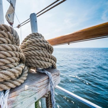 ropes tied up on a sailboat at sea 