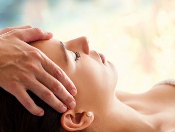 A woman having a luxury facial massage for forty five minutes.