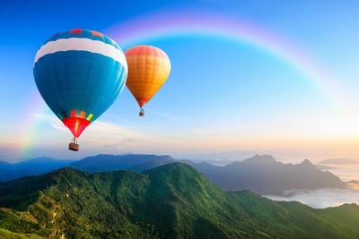 hot air balloons hills rainbow meditation group