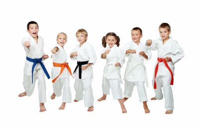 children practicing karate