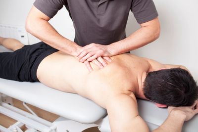 Patient getting a massage. Chesapeake Pain Center offers a variety of modalities of treatment. 