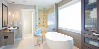Large bathroom with freestanding tub and separate shower