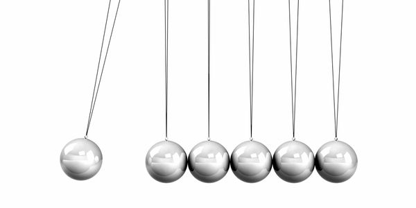 newton's cradle depicting trance like state in hypnotherapy