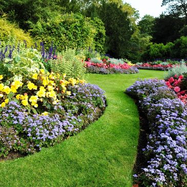 A lush flower garden with a landscaping design