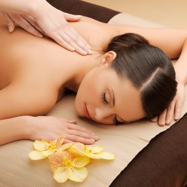 woman receiving a massage therapy treatment