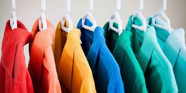 rainbow colour shirts on rack