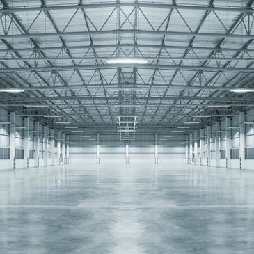 High Shine waxed concrete floor in warehouse setting
