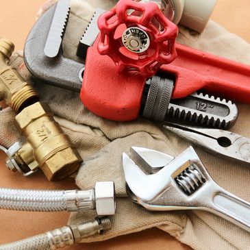 plumbing tools, wrenches, pliers, pipe wrench