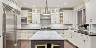 Kitchen remodel in Westlake, Ohio - cabinets, countertop and tile backsplash by Smiff’s Remodeling